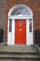 Georgian doorway near Merrion Square with red doorIreland Eire Dublin Georgian Architecture Doorways