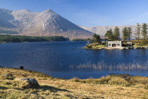 Lough Inagh with boat house and Twelve Bens Mountains behind Ireland Eire Landscapes Loughs Mountains