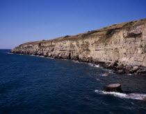 View west from Seacombe Quarry across the sea towards Winspit Quarry European Scenic Great Britain Northern Europe UK United Kingdom