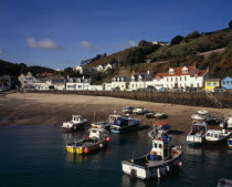 St Martins. Rozel fishing village on the north coast. View from the jetty towards fishing boats  sandy beach and waterfront houses European Scenic Beaches Northern Europe Resort Seaside Shore Tourism