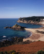 St. Brelade. Portelet Bay with Isle au Guerdain a tower built on a tidal island seen in the centreAlso known as Janvrins Tomb Named after Captain Janvrin buried there after he died of plague aboard h...