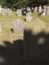 Weather worn headstones in the cemetery of the Church os St Mary de Haura.Graveyard  Buried  Burial site  Necrooplis Tombstones  Graves  Headstone  Tombstone European Great Britain Northern Europe U...