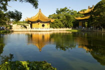 Pagoda and tank in front of the Puji TempleAsia Asian Chinese Chungkuo Jhonggu Zhonggu Religious