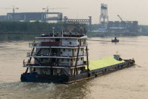 Barge carrying sulphur on the Yangtze River east of WuhanAsia Asian Chinese Chungkuo Jhonggu Zhonggu Sulfur