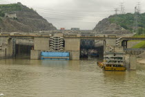 Sand barge approaching the westbound 5 step locks at the Three Gorges Dam on the Yangtze River at SandoupingAsia Asian Chinese Chungkuo Jhonggu Zhonggu 3 Five