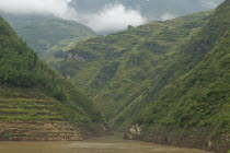 Terraced hillsides in the Wu GorgeAsia Asian Chinese Chungkuo Jhonggu Zhonggu 3 Scenic
