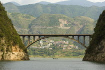 Bridge over the Daning River with Wushan in backgroundAsia Asian Chinese Chungkuo Jhonggu Zhonggu Scenic
