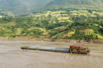 Barge on the Yangtze River near Wushan passing rich farmlandAsia Asian Chinese Chungkuo Jhonggu Zhonggu Farming Agraian Agricultural Growing Husbandry  Land Producing Raising Scenic