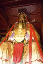 Diety in temple at Fengdu Abode of GhostsAsia Asian Chinese Chungkuo Jhonggu Zhonggu Religion