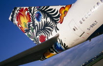 Boeing 747-400 at Gatwick Airport operated by British Airways. Detail of tail design by artist Danuta Wojda from Poland entitled Cockerel of LowiczEastern Europe European Polish Polska
