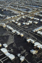 Aerial view over slum housing with stilt buildings built over untreated sewageAmerican Equador Hispanic Latin America Latino shanty South America