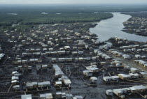 Aerial view over slum housing with stilt buildings built over untreated sewageAmerican Equador Hispanic Latin America Latino shanty South America