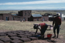 Brick making. Near Machaca. American Bolivian Hispanic Latin America Latino South America