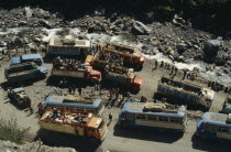 Road block on road to La Paz with view over buses  trucks and passengers at a standstill in roadAmerican Bolivian Hispanic Latin America Latino South America
