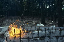 The army burning and destroying a jungle cocaine laboratory in the war against illegal drugsAmerican Colombian Columbia Hispanic Latin America Latino South America