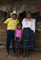 Full lengh standing portrait of a Q eqchi Indian family  a rich land owner with his wife and daughterIndigenous people American Central America Hispanic Indegent Kids Latin America Latino