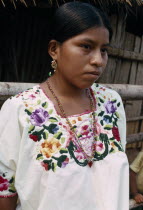 Portrait of a Q eqchi Indian girl wearing a hand embroidered blouse Indigenous people American Central America Hispanic Indegent Latin America Latino One individual Solo Lone Solitary
