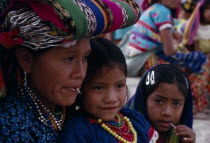 Quiche Indian mother and daughter at San Andres festival American Central America Hispanic Kids Latin America Latino Mum