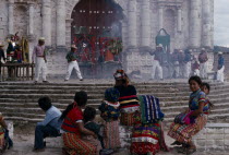 Quiche Indians watching fireworks in front of the 16th century church during San Andres Festival on December 8thAmerican Central America Explosive Hispanic Kids Latin America Latino Pyrotechnics Reli...