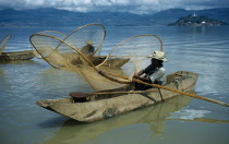 Fishermen butterfly net fishing from canoes on Lake PatzcuaroAmerican Hispanic Latin America Latino Mexican