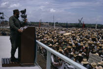 Fidel Castro. President of Cuba and Communist Revolutionary leader giving a speech to workers at the inauguration of a Dam in 1968. Caribbean Cuban Hispanic Latin America Latino West Indies