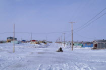 The Great Whale Settlement. Cree indigenous community. Housing and roads in heavy snow cover with a skidoo travelling past. Great Whale River Crees American Canadian Indegent North America Scenic Tr...