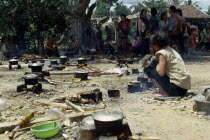 Vietnam War. Montagnard refugee village. Cooking area with pots on small open firesKon TumAsian Southeast Asia Viet Nam Vietnamese