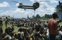 Vietnam War. Montagnard refugees and United States helicopterKon TumAsian Southeast Asia Viet Nam Vietnamese
