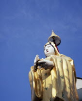 Wat Ratchasingkhon temple on the banks of the Chao Phraya river.   Guanyin  Goddess of Mercy statue  the bodhisattva of compassion as venerated by East Asian Buddhists usually depicted as a female fig...