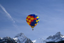 One Hot Air Balloon in flight above jagged snow covered peaks.European Schweiz Suisse Svizzera Swiss Western Europe  Hot Air Balloons Leisure Transport 1 Guangzhou Single unitary