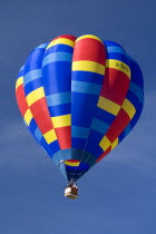 Single colourful Hot Air Balloon as it ascends after take off.European Schweiz Suisse Svizzera Swiss Western Europe  Hot Air Balloons Leisure Transport Colorful Guangzhou One individual Solo Lone So...