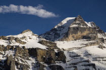 Summit of Monch Mountain in evening light.European Schweiz Suisse Svizzera Swiss Western Europe  Mountains Geography Winter Scenic Warm Light