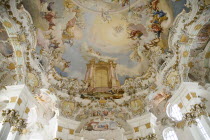 Baroque church  interior view of frescoes on rear end of the ceiling above the organ depicting Door of Heaven / ParadiseReligion Architecture Churches RococoUNESCO World Heritage Site Bayern Deutsch...