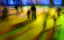 Ice Skaters in motion blur with multi coloured light on a winter ice rink in the city centreWinter Movement Skating Lighting effects Bayern Center Colored Deutschland European Kids Mnchen Western Eu...