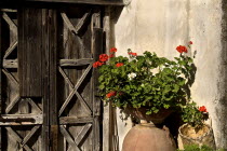 Villa Cimbrone. Urn with flowers at an entrance gateArchitecture Flowers Buildings Doorways European Italia Italian Southern Europe