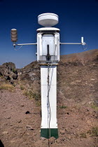 Perimeter of volcanic crater with seismic apparatus.Mountains Volcanoes Seismic Instruments European Italia Italian Southern Europe