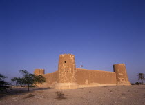Exterior view of a fort with crenellated towers  built in 1938 and used as a police border post  now a museum.  History Middle East Qatari