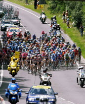 Tour de France Kent Stage 2007  main group of riders with outriders and support vehicles.European French Western Europe
