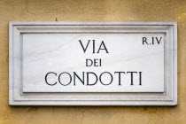 Marble street sign on a wall for Via Dei Condotti the high fashion shopping streetEuropean Italia Italian Roma Southern Europe