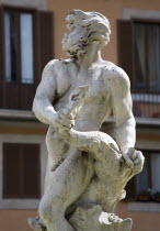 The Fontana del Moro or Fountain of the Moor in Piazza Navona. This central figure of a triton riding a dolphin was carved by Bernini in 1654 and resembles a Moor which gives the fountain its nameEur...