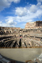 The Colosseum amphitheatre interior with tourists built by Emperor Vespasian in AD 80 in the grounds of Domus Aurea the home of Emperor Nero showing the restored sections in the foregroundEuropean It...