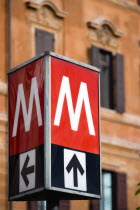 Red and white metro underground sign in Ottaviano stationEuropean Italia Italian Roma Southern Europe Roundel