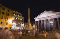 Tourists at night in the illuminated Piazza della Rotunda with the Fountain in the centre and the Pantheon on the rightEuropean Italia Italian Roma Southern Europe Center History Holidaymakers Nite R...