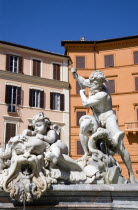 Piazza Navona The Fontana di Nettuno or Fountain of Neptune with the central figure of the sea god Neptune fighting an octopusEuropean Italia Italian Roma Southern Europe Gray History Religion