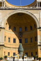 Vatican City Museums The Cortille della Pigna a huge bronze pine cone from a Roman fountain in a niche below the Papal heraldic crest in a niche by Pirro Ligorio on the Belvedere PalaceEuropean Itali...