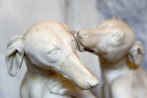 Vatican City Museums Detail of a marble statue of one dog licking the ear of another in the Room of Animals in the Belvedere PalaceEuropean Italia Italian Roma Southern Europe 1 Catholic Principality...