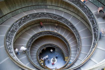 Vatican City Museums Tourists descending the Spiral Ramp designed by Giuseppe Momo in 1932 leading from the museums to the street level belowEuropean Italia Italian Roma Southern Europe Catholic Prin...