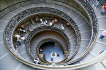 Vatican City Museums Tourists descending the Spiral Ramp designed by Giuseppe Momo in 1932 leading from the museums to the street level belowEuropean Italia Italian Roma Southern Europe Catholic Prin...