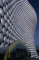 Selfridges Store at The Bullring Shopping Centre. Exterior detail of the spun aluminium discs and glass entrance.European Centre Great Britain Europe UK United Kingdom Aluminum British Isles Center N...