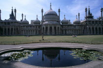 The Royal Pavilion exterior seen from across lilly pond.European Great Britain Europe Pavillion UK United Kingdom British Isles Northern Europe